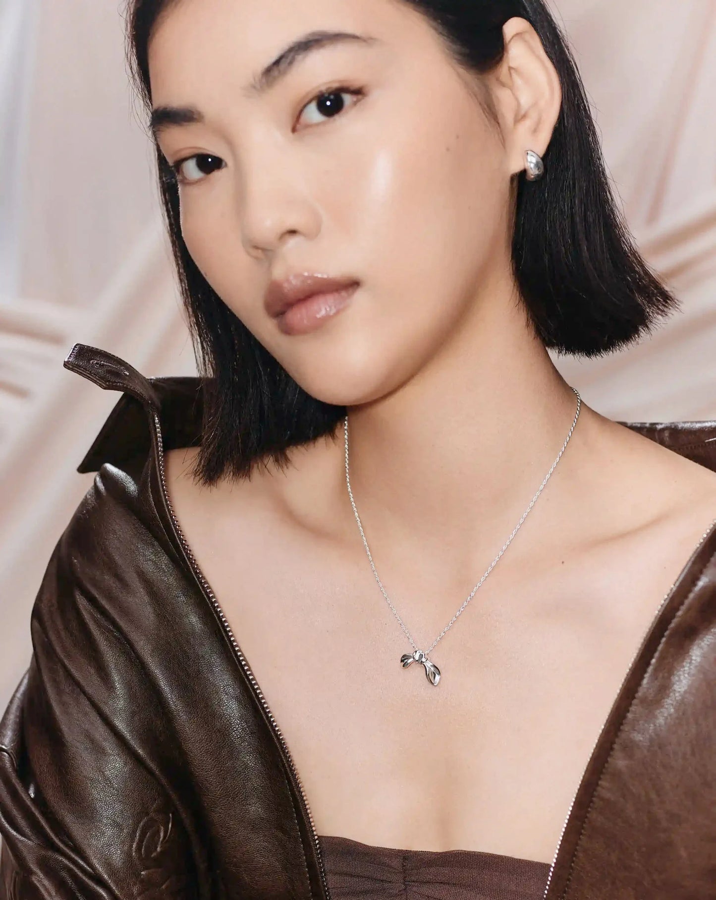 MARKGONG Bow Pendant Necklace | Silver Plated