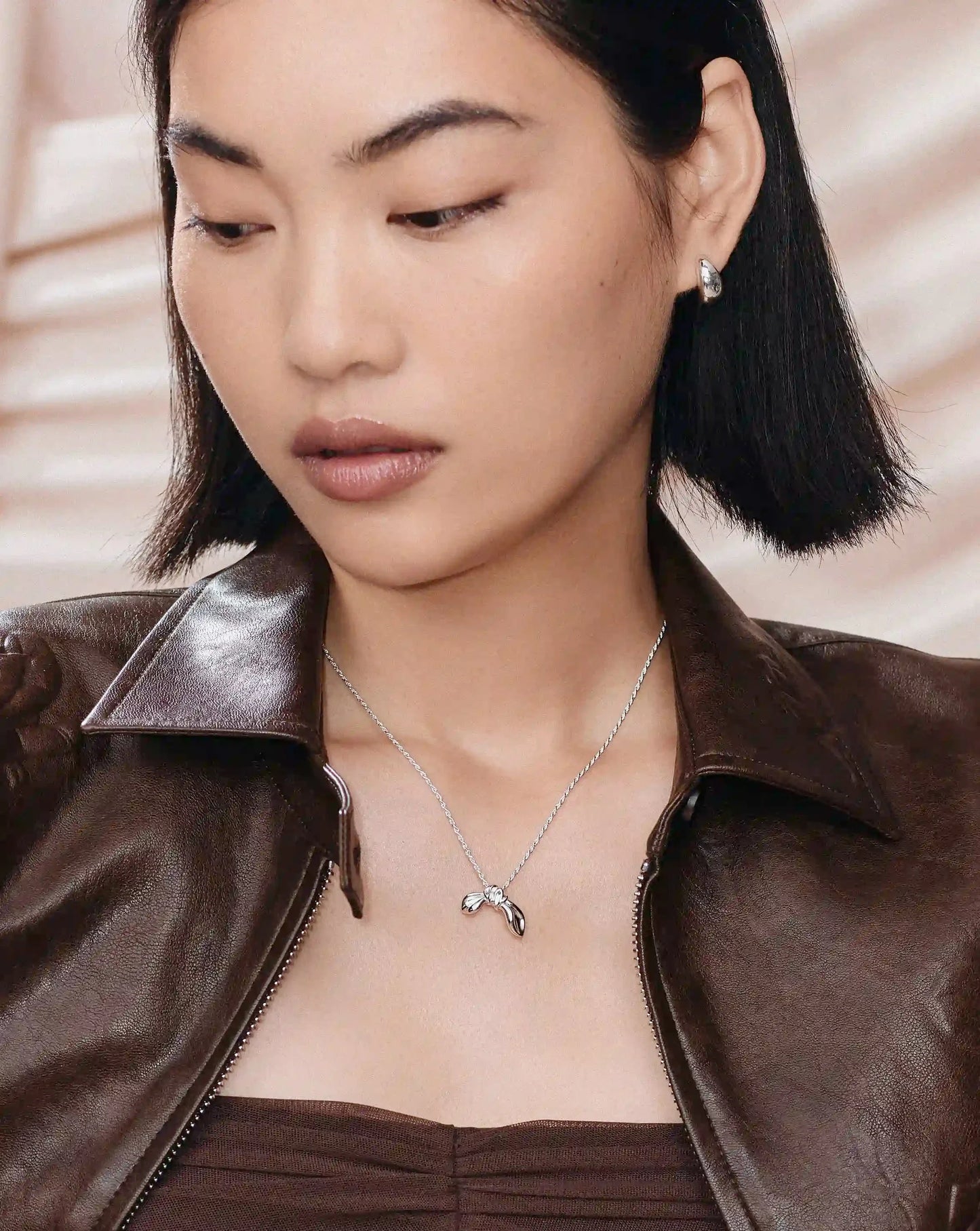 MARKGONG Bow Pendant Necklace | Silver Plated